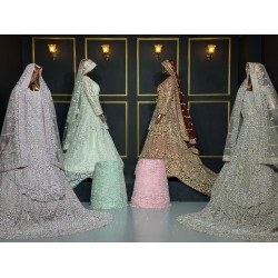 Designer Long Trail Lehenga Choli in Net Fabric with Full Heavy Work Taaj Look and Sparkling Jarkan Stone Embellishments