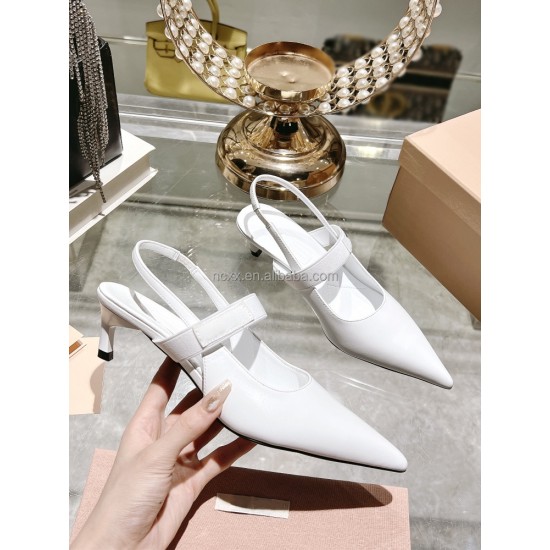 A Woman with a New Style of Pointed-toe Cool Shoes Made of Genuine Leather