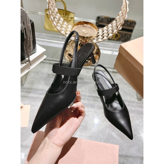 A Woman with a New Style of Pointed-toe Cool Shoes Made of Genuine Leather